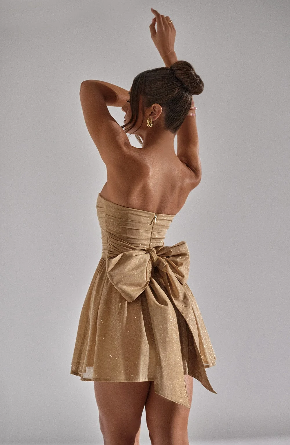 Strapless Bow-Back Mesh Mini Dress Gorgeous Feather Strapless Bow-Back Mesh Mini Dress in Gold — bow-back view