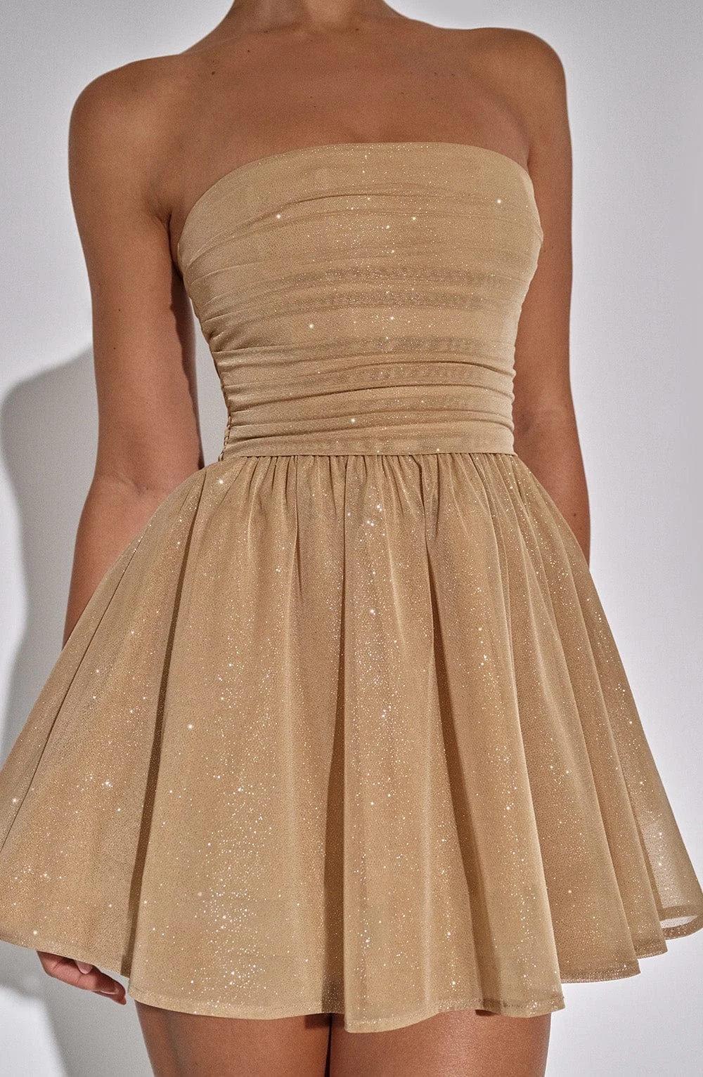 Strapless Bow-Back Mesh Mini Dress Gorgeous Feather Strapless Bow-Back Mesh Mini Dress in Gold — bodice and skirt detail